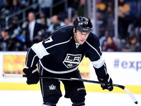 Milan Lucic #17 of the Los Angeles Kings lines up for a faceoff during a preseason game against the Arizona Coyotes at Staples Center on September 22, 2015.