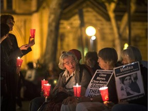 A candle light vigil for two refugees who set themselves on fire on the remote Pacific island of Nauru, in Sydney, last month. The plight of refugees that Australia is holding in two offshore camps has been a key issue in the country's current election campaign.