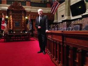 B.C. legislature sergeant-at-arms Gary Lenz stands in the chamber.