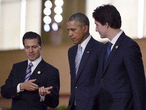 Prime Minister Justin Trudeau with U.S. President Barack Obama and Mexico's President Enrique Pena Nieto at the Asia-Pacific Economic Cooperation summit in Manila last November.