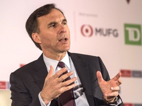Federal Finance Minister Bill Morneau speaks at the Canada Summit: Disrupting the Status Quo conference in Toronto on Wednesday.