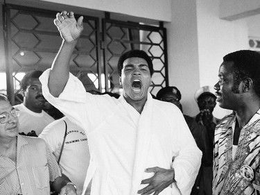 FILE - This is a Thursday, Sept. 12, 1974  file photo of Muhammad Ali, who is due to fight World Champion Georeg Foreman  tells a crowd of boxing fans in N' Sele Zaire,   "Ako bo mai ye,"  which translates from Zaire's Lingalla dialect as: "I will kill him."  Ali's trainer Angelo Dundee is at left,  It was 40 years ago that two men met just before dawn on Oct. 30, 1974, to earn $5 million in the Rumble in the Jungle. In one of boxing's most memorable moments, Muhammad Ali stopped the fearsome George Foreman to recapture the heavyweight title in the impoverished African nation of Zaire.   (AP Photo/Horst Faas, File) ORG XMIT: POS2014103013182622      Muhammad Ali options ORG XMIT: POS1606031709150306