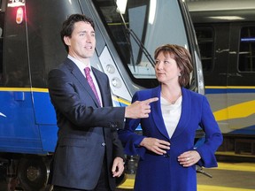 Prime Minister Justin Trudeau, pictured last week with B.C. Premier Christy Clark at a Burnaby public transit announcement, says he supports interprovincial efforts to get carbon emissions down and emphasize hydroelectricity as a power source, saying ‘it’s good for the economy we need to build.’