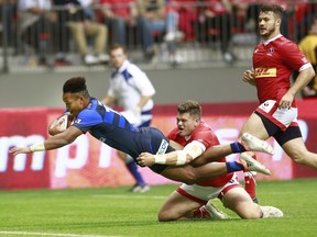 Jamie Mackenzie fails to haul in Kotara Matsushima as he scores the winning try in Japan's 26-22 victory over Canada