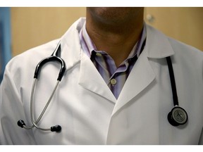 MIAMI, FL - JUNE 02:  A doctor wears a stethoscope as he see a patient for a measles vaccination during a visit to the Miami Children's Hospital on June 02, 2014 in Miami, Florida. The Centers for Disease Control and Prevention last week announced that in the United States they are seeing the most measles cases in 20 years as they warned clinicians, parents and others to watch for and get vaccinated against the potentially deadly virus.