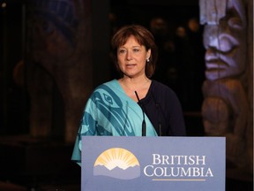Premier Christy Clark makes an announcement regarding ancestral remains and belongings of cultural significance during a ceremony at the Royal B.C. Museum in Victoria, B.C., Tuesday, June 21, 2016.