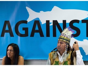 Cheryl Bear, left, a councillor with the Nadleh Whut'en First Nation, and Hereditary Chief Pete Erickson, of the Nak'azdli First Nation, listen during a news conference about the Enbridge Northern Gateway pipeline in Vancouver on Thursday, October 1, 2015. The Federal Court of Appeal says Canada failed in its duty to consult with aboriginal people before giving the green light to a controversial pipeline proposal to link Alberta's oil sands to British Columbia's north coast.
