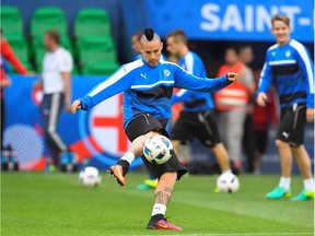 Slovakia midfielder Marek Hamsik, shown in training Sunday, scored one goal and set up another during his team's 2-1 win over Russia last week.