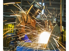 File: Dustynn Diack working in the welding class at Kwantlen Polytechnic University campus in Cloverdale, B.C., on February 11, 2015.