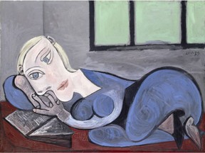 Femme couche lisant, oil on canvas, 1939, by Pablo Picasso. For Picasso: The Artist and His Muses at the Vancouver Art Gallery, June 11 to Oct. 2, 2016. [PNG Merlin Archive]