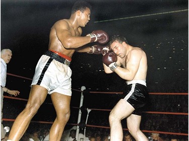 Happy birthday, George Canadian boxing icon George Chuvalo, shown here going the distance with Muhammad Ali in their 1966 world heavyweight title fight, turns 73 years young Sunday. Chuvalo, who's currently penning his autobiography, will be a special guest of Edmonton's KO Boxing at Friday's six-bout pro card at the Subway Soccer Centre in Calgary. ORG XMIT: POS2016060317065044      Muhammad Ali options ORG XMIT: POS1606031709170309