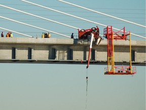 In Canada men are 20 more times more likely than women to die in the workplace. This is the scene of a fatality crane tipover during construction of the Canada Line bridge in 2008.
