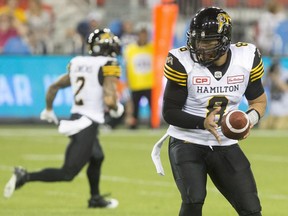 Hamilton Tiger-Cats quarterback Jeremiah Masoli looks to make a play against Toronto Argonauts during second half CFL football action in Toronto on Thursday June 23, 2016. He was excellent filling in for injured starter Zach Collaros.