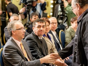 John Rustad, B.C. minister of aboriginal relations and reconciliation, greets an attendee at a 2014 revenue-sharing agreement signing for development of LNG export facilities at Grassy Point near Prince Rupert, with the Lax Kw'alaams and Metlakatla First Nations.
