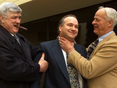 (L to R) Pat Quinn, Ron Toigo and Gordie Howe clown around during negotiations for a West Hockey League franchise in Vancouver in 2000.