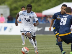 Playing for Whitecaps FC 2, Alphonso Davies advances against LA Galaxy II in a May 15 game at UBC's Thunderbird Stadium. Bob Frid/PNG files