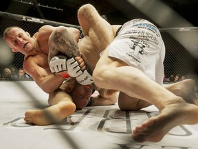 Misha Cirkunov, left, makes short work of Shaun Asher during HK43 at Markin McPhail Centre in Calgary in 2015. Cirkunov has won two straight since being called up to the UFC.
