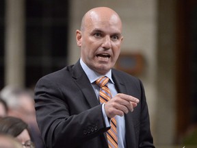 NDP Finance Critic Nathan Cullen asks a question during Question Period in the House of Commons in Ottawa on April 23, 2015. Veteran British Columbia MP Nathan Cullen says he won't be mounting a bid to succeed Tom Mulcair as the leader of the federal New Democrats.Cullen, first elected in 2004 to the sprawling northwestern B.C. riding of Skeena-Bulkley Valley, says he wants to focus instead on Canada's upcoming efforts in electoral reform.