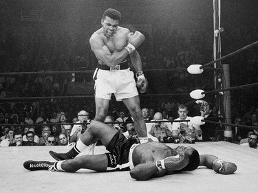 FILE - In this May 25, 1965, file photo, heavyweight champion Muhammad Ali, then known as Cassius Clay, stands over challenger Sonny Liston, shouting and gesturing shortly after dropping Liston with a short hard right to the jaw, in Lewiston, Maine. Ali, the magnificent heavyweight champion whose fast fists and irrepressible personality transcended sports and captivated the world, has died according to a statement released by his family Friday, June 3, 2016. He was 74.  (AP Photo/John Rooney, File) ORG XMIT: NY200