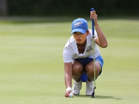 Women's Individual Champion Kat Kennedy of the UBC Thunderbirds lines up a putt during final-round action at the Canadian University/College Championship at Morningstar Golf Club in Parksville last week.