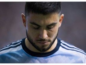 Vancouver Whitecaps captain Pedro Morales walks off the field after receiving a red card against the Houston Dynamo on May 28.