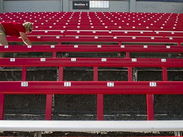 VANCOUVER,BC:JUNE 20, 2016 -- Staff wipe down the bleachers ahead of the doors opening at Nat Bailey Stadium for opening night of Vancouver Canadians baseball as they take on the Everett AquaSox in Vancouver, BC, June, 20, 2016.