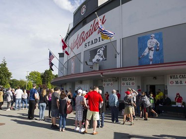 VANCOUVER,BC:JUNE 20, 2016 -- Fans wait for to doors open at Nat Bailey Stadium for opening night of Vancouver Canadians baseball as they take on the Everett AquaSox in Vancouver, BC, June, 20, 2016.