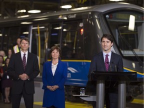 Recent announcements on transit funding in B.C. with Vancouver Mayor Gregor Robertson, Premier Christy Clark and Prime Minister Justin Trudeau (left to right) seem to be premature, says commentator Elizabeth Murphy.