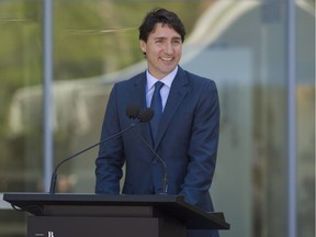 Prime Minister Justin Trudeau speaks to the crowd at the official unveiling of the Pierre Lassonde Pavillon at Musee national des beaux-arts du Quebec in Quebec City on Friday June 24, 2016.