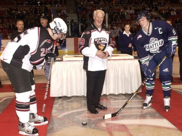 Gordie Howe drops the puck for Vancouver Giants Tyson Marsh (left) Seattle Thunderbirds' Dustin Johner in a game where about 4,000 Gordie Howe bobble heads were sold at the Pacific Coliseum.