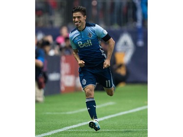 Vancouver Whitecaps' Nicolas Mezquida celebrates his goal against the New England Revolution during first half MLS soccer action in Vancouver, B.C., on Saturday June 18, 2016. THE CANADIAN PRESS/Darryl Dyck ORG XMIT: VCRD108