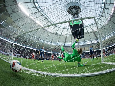Vancouver Whitecaps goalkeeper David Ousted (1) allows a goal to New England Revolution's London Woodberry, not shown, during first half MLS soccer action in Vancouver, B.C., on Saturday June 18, 2016. THE CANADIAN PRESS/Darryl Dyck ORG XMIT: VCRD106