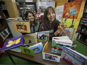 Squamish  B.C.  June 16, 2016    The gift of reading-- Trudie Neubert and Hasrat Grewal-Gill help new immigrants and children with their language and reading skills at the Squamish welcome centre,  where iPALS and the Raise-a-Reader program has assisted the community.   Many of the books are ready to help young children read.   Mark van Manen/ PNG Staff photographer   see  Brian Morton (Raise-a-Reader) Vancouver Sun     and  Web. stories   00043697A [PNG Merlin Archive]