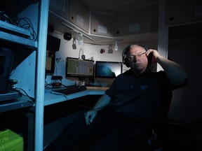 Steve Bradshaw, Cowichan Valley Amateur Radio Society president, operates a radio from the communications trailer in Cobble Hill, B.C.