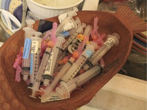 The home of health care worker Kerri O'Keefe, who died from an overdose in Surrey last August, had dozens of discarded vials and syringes of drugs she took from the biohazard bins at her workplace at the Vancouver General Hospital emergency ward.