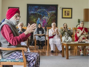 Residents take part in a sitting yoga class at Guru Nanak Dewas, a "culturally sensitive" seniors residence in Surrey devoted for the most part to South Asians, particularly those who don't speak English.