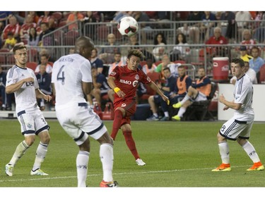 Toronto FC's Tsubasa Endoh (9) sends a shot wide of the Vancouver Whitecaps net during second half Canadian Cup action in Toronto on Tuesday June 21, 2016.
