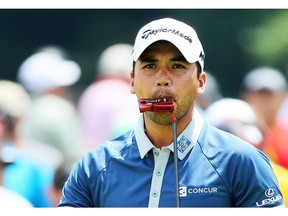 OAKMONT, PA - JUNE 17:  Jason Day of Australia reacts on the eighth green during the continuation of the weather delayed first round of the U.S. Open at Oakmont Country Club on June 17, 2016 in Oakmont, Pennsylvania.