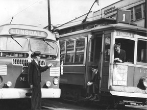 Drivers of a Lonsdale streetcar and a bus meet in North Vancouver, circa 1947. TransLink's Buzzer is 100 year old today, created to help fight private jitney buses that had started to battle the established streetcar network for passengers.