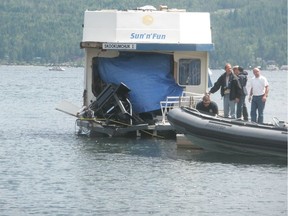 The houseboat in this photo was in a collision with a speedboat July 3, 2010 in Magna Bay, located about 30 kilometres north of Salmon Arm in Shuswap Lake.