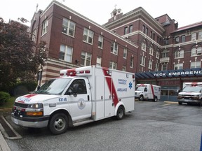 File: An ambulance leaves St. Paul's Hospital in Vancouver, BC, April 23, 2015.