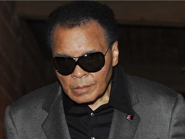 Boxing legend Muhammad Ali arrives at District 319 in downtown Vancouver Thursday October 8, 2009 for the screening of a VIFF movie about his life Facing Ali.
