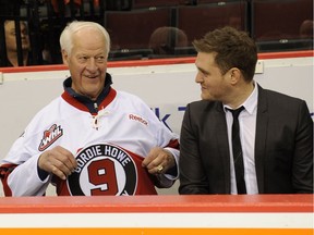 Gordie Howe and Michael Buble were there to show off the new jerseys at the Pacific Coliseum in Vancouver, Feb. 2, 2012.