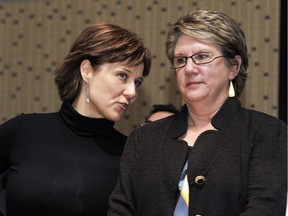 Premier Christy Clark and Moira Stilwell share a word in 2011 during the Liberal party's leadership race. [PNG files]
