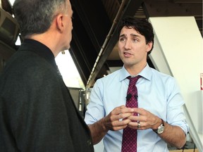 Prime Minister Justin Trudeau talks to Postmedia correspondent Peter O’Neil on Thursday in Vancouver.