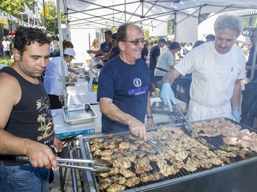 Grilled chicken is on the menu for Greek Day on West Broadway in Vancouver, B.C., June 26, 2016.