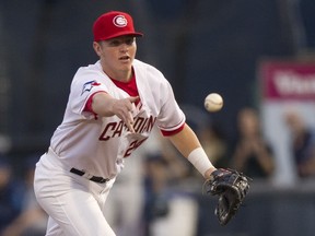 Canadians Christian Williams tosses a ball toward first base in Northwest League action against the Everett AquaSox at Nat Bailey Stadium in Vancouver on Monday. Williams is a big fan of former Atlanta Brave Chipper Jones.