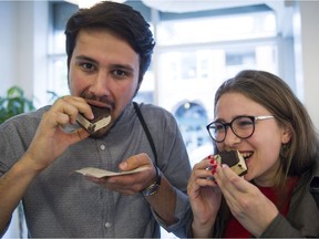 VANCOUVER,BC:JUNE 22, 2016 -- Nikola Miloradovic (l) and Valeria Nuyanzina (r) sample ice cream sandwiches during the Off the Eaten Track Gourmet Ice Cream tour in Vancouver, BC, June, 22, 2016. (Richard Lam/PNG) (For Dana Gee) 00043873A [PNG Merlin Archive]