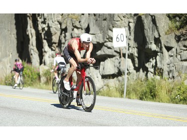 The top Canadian and third place finishing Trevor Wurtele on the bike at the 2016 Ironman Canada in Whistler, B.C.