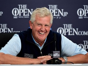 Colin Montgomerie of Scotland 'apologizes' for the weather at Monday's news conference in Troon Scotland, host of this year's Open Championship. 'It's my fault. I'm being blamed for it," he said of the forecast. Three of the four tournament days include rain and wind.